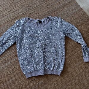 H&M sequinned sweater.